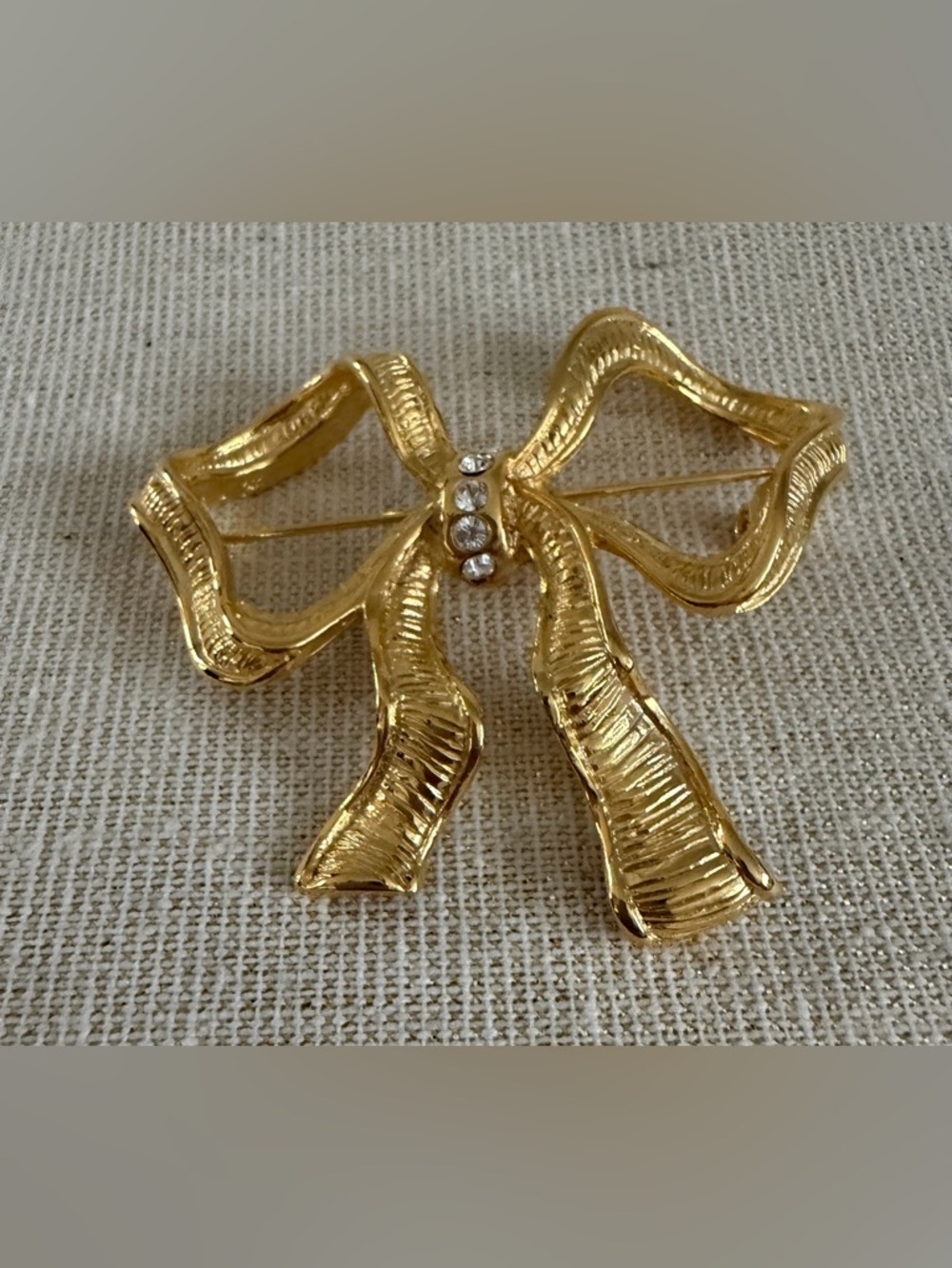 Gold Bow Ribbon Brooch with Crystal Accents